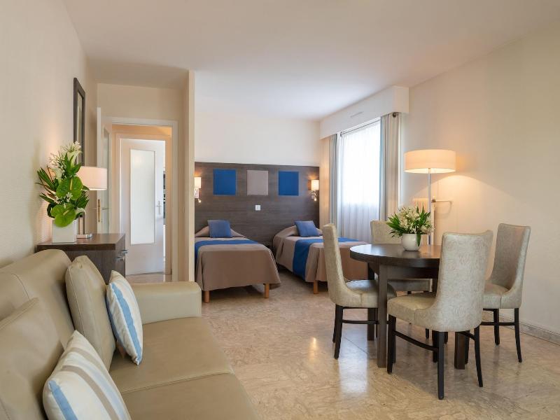 Hotel The Originals Residence Les Strelitzias